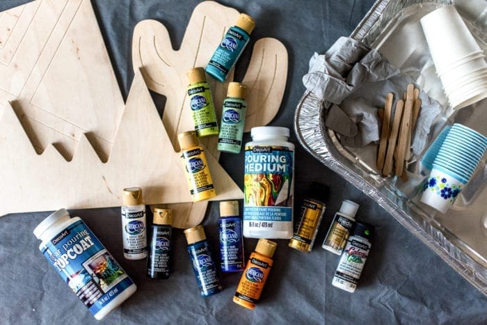 DIY paint pouring on wood shapes from Dear handmade Life